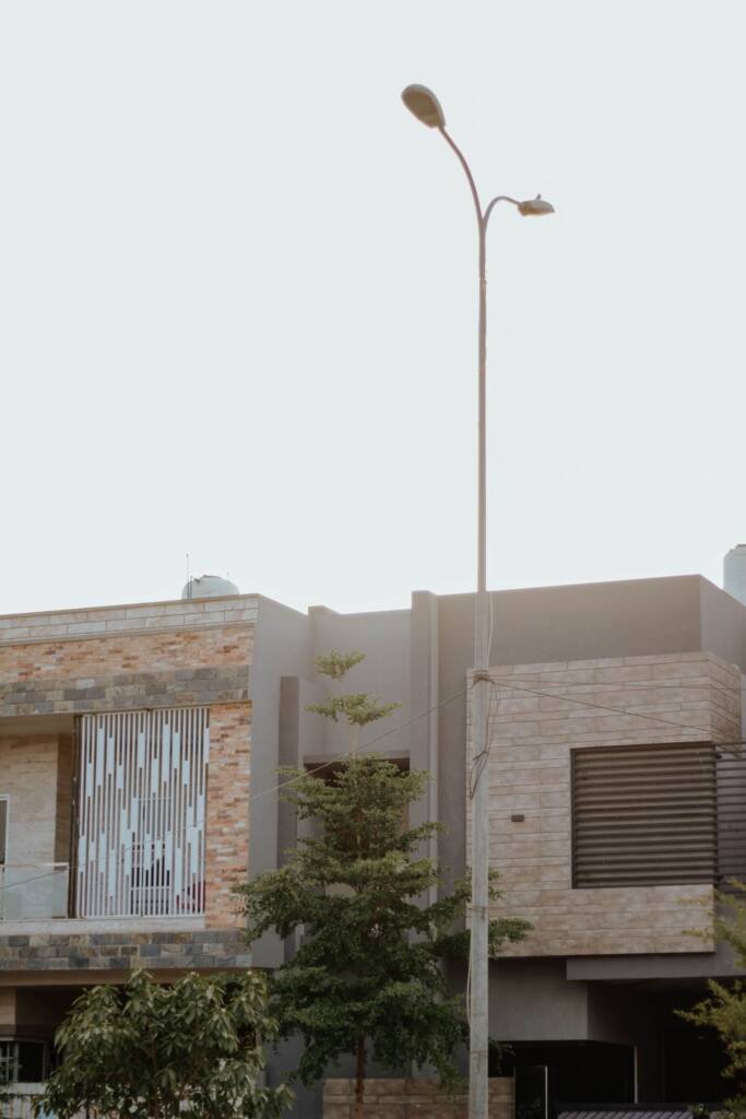 Modern house front elevation with stone accents and clean lines