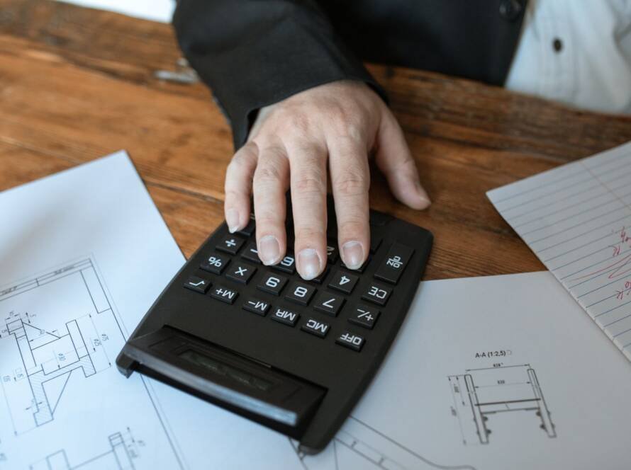 Using a calculator over construction drawings to check a quotation