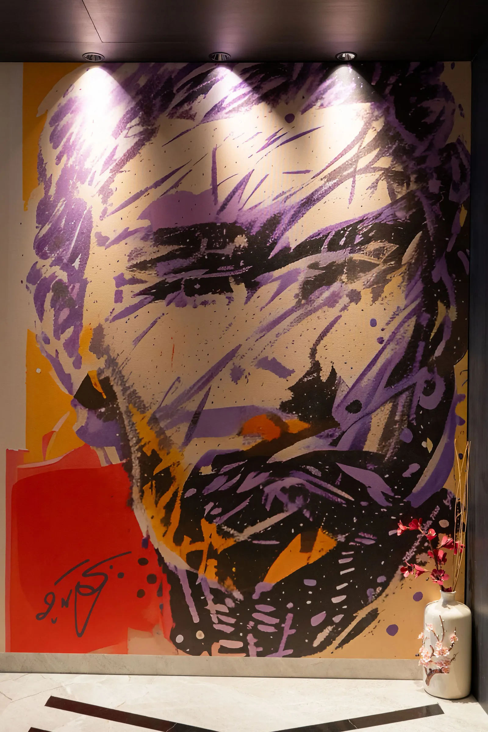 Backlit feature art panel in the passage