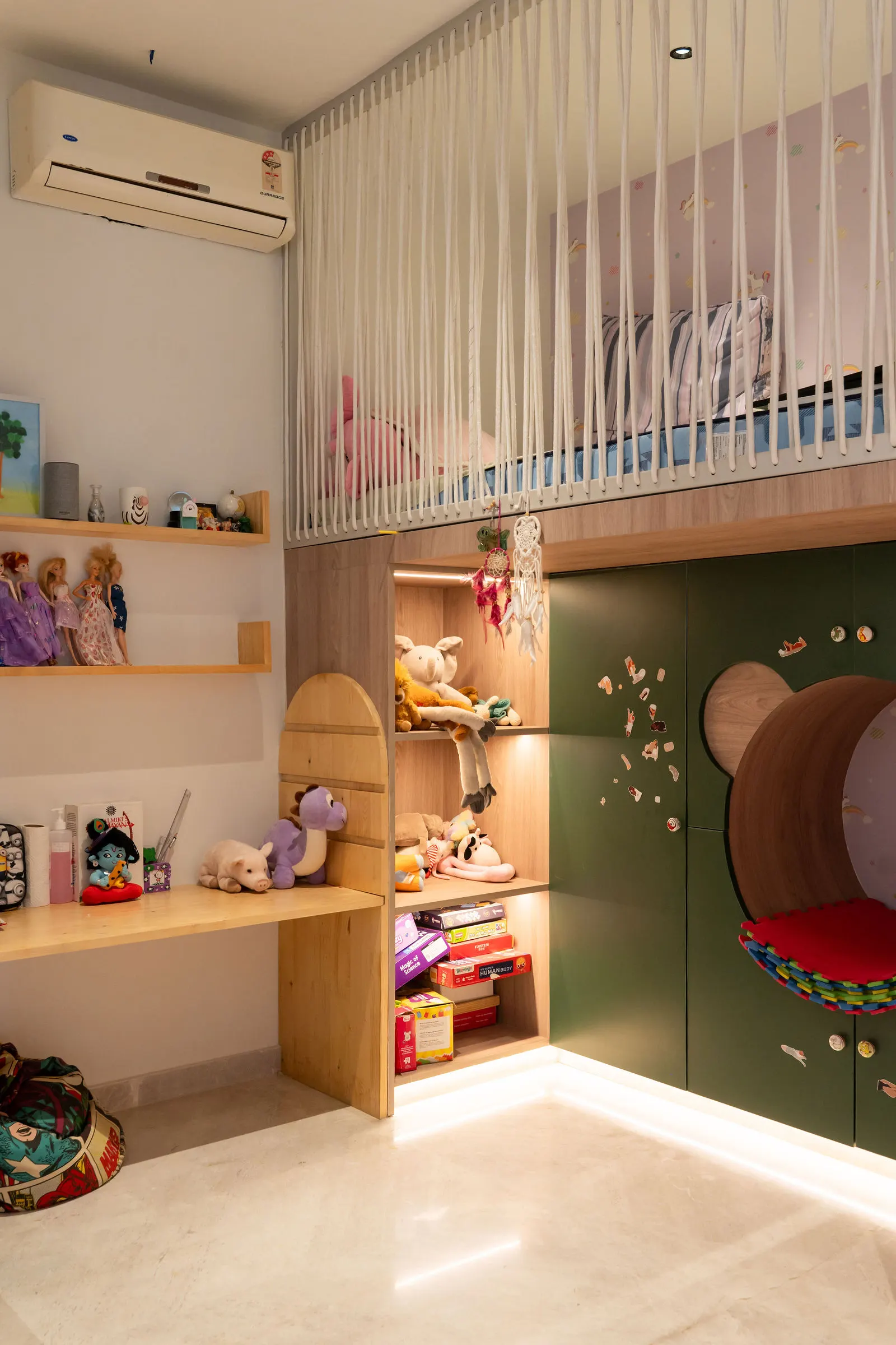 Kids room with built-in storage and a study niche
