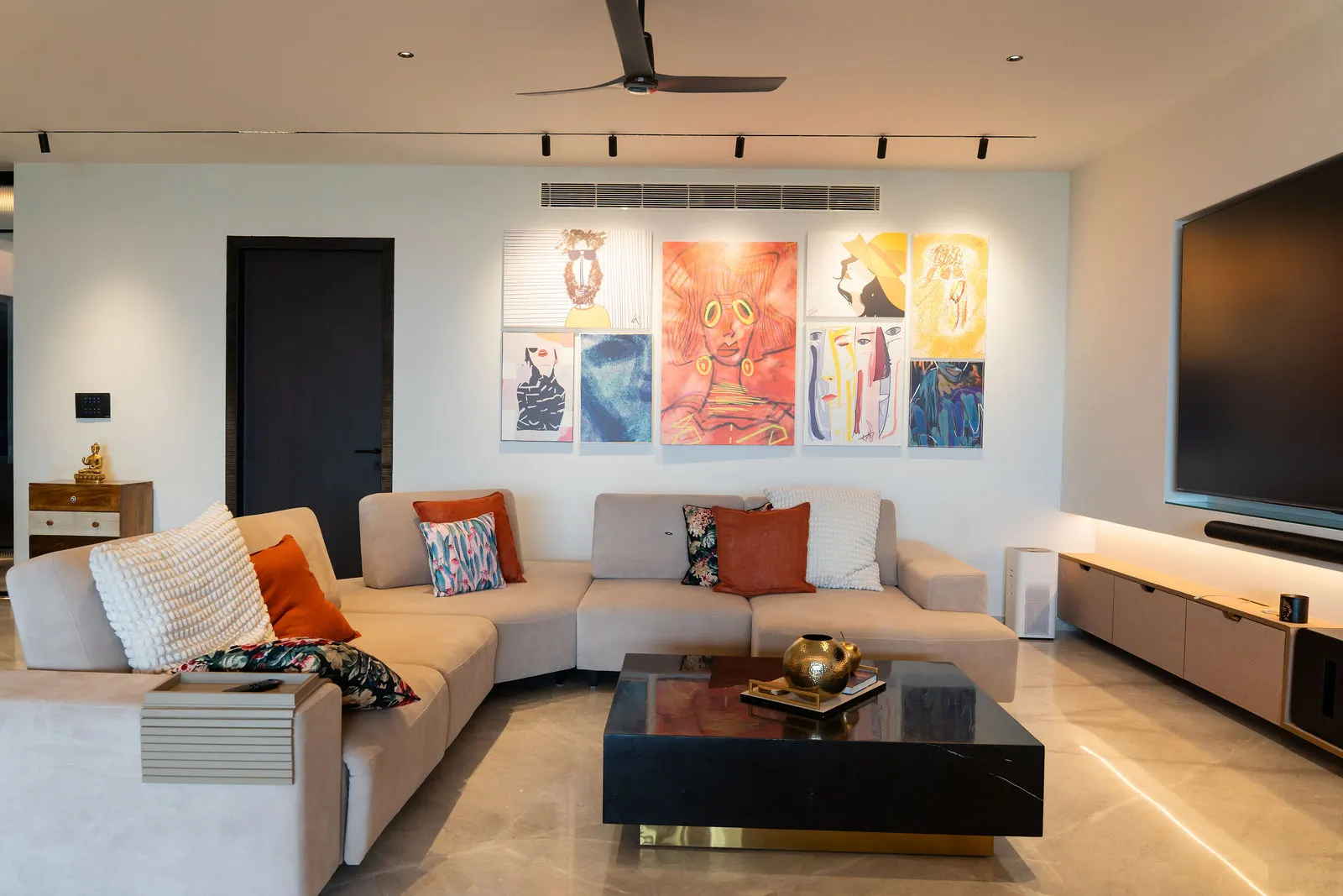 Living room seating with recessed track lighting