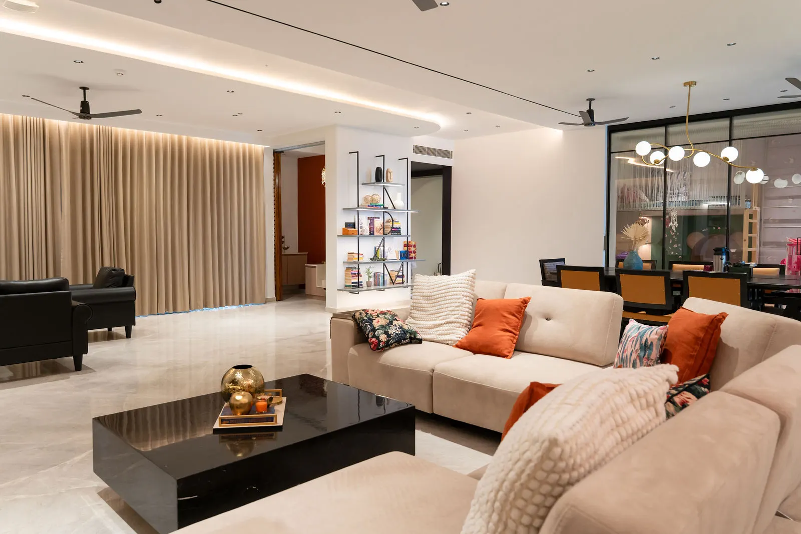 White sofa and dark side chairs in the living room