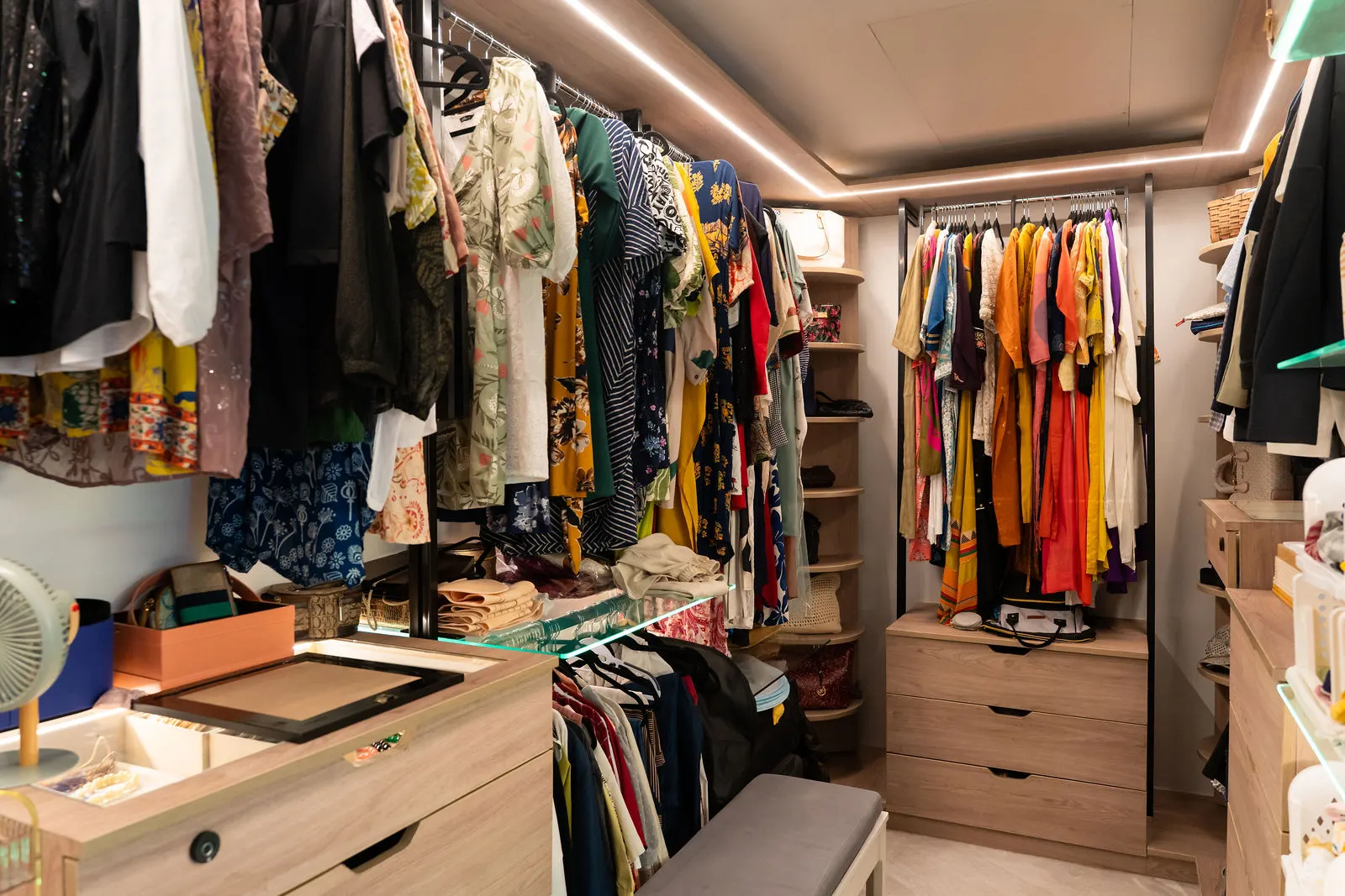 Walk-in wardrobe with open hanging and drawer units